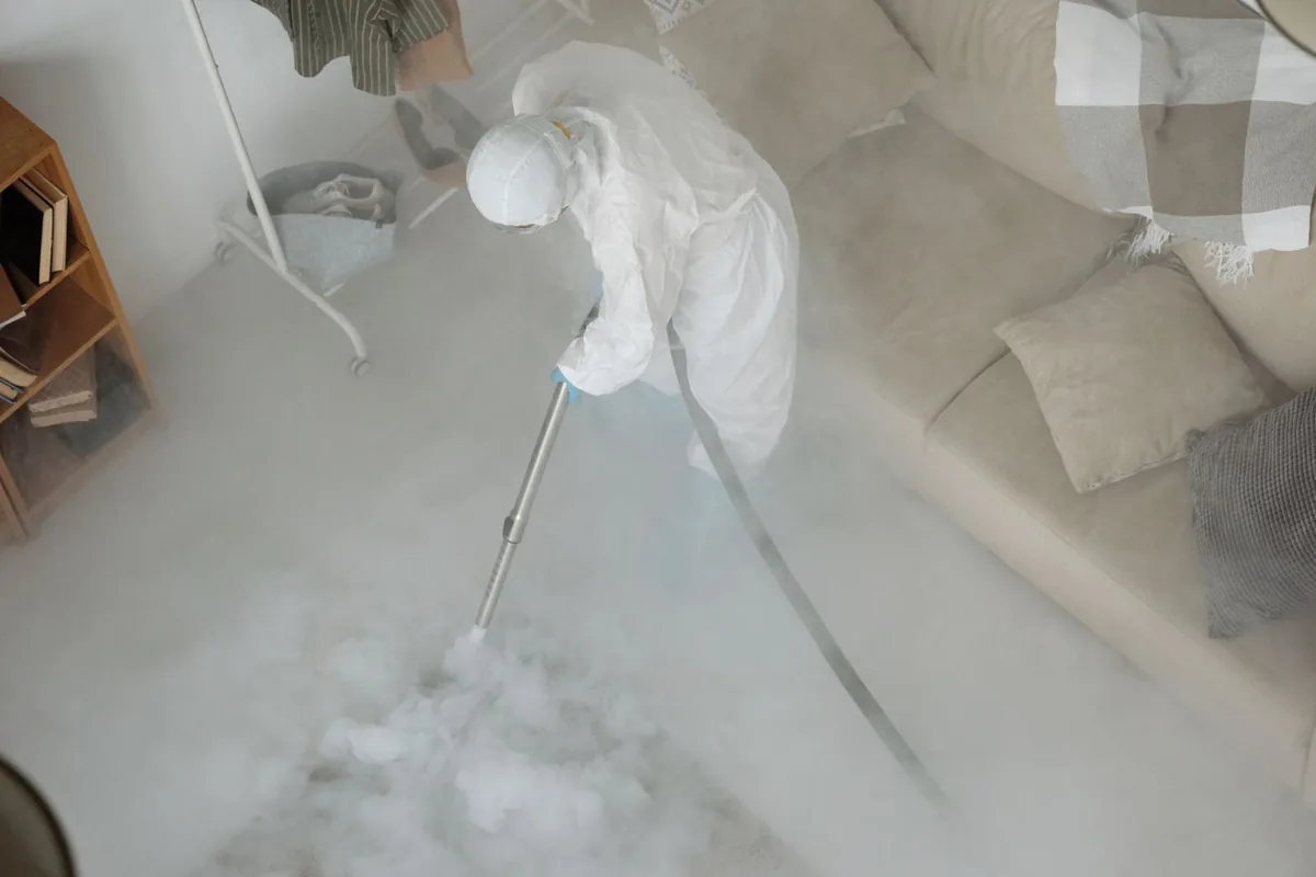 Biohazard cleanup technician in protective equipment, Walworth, WI